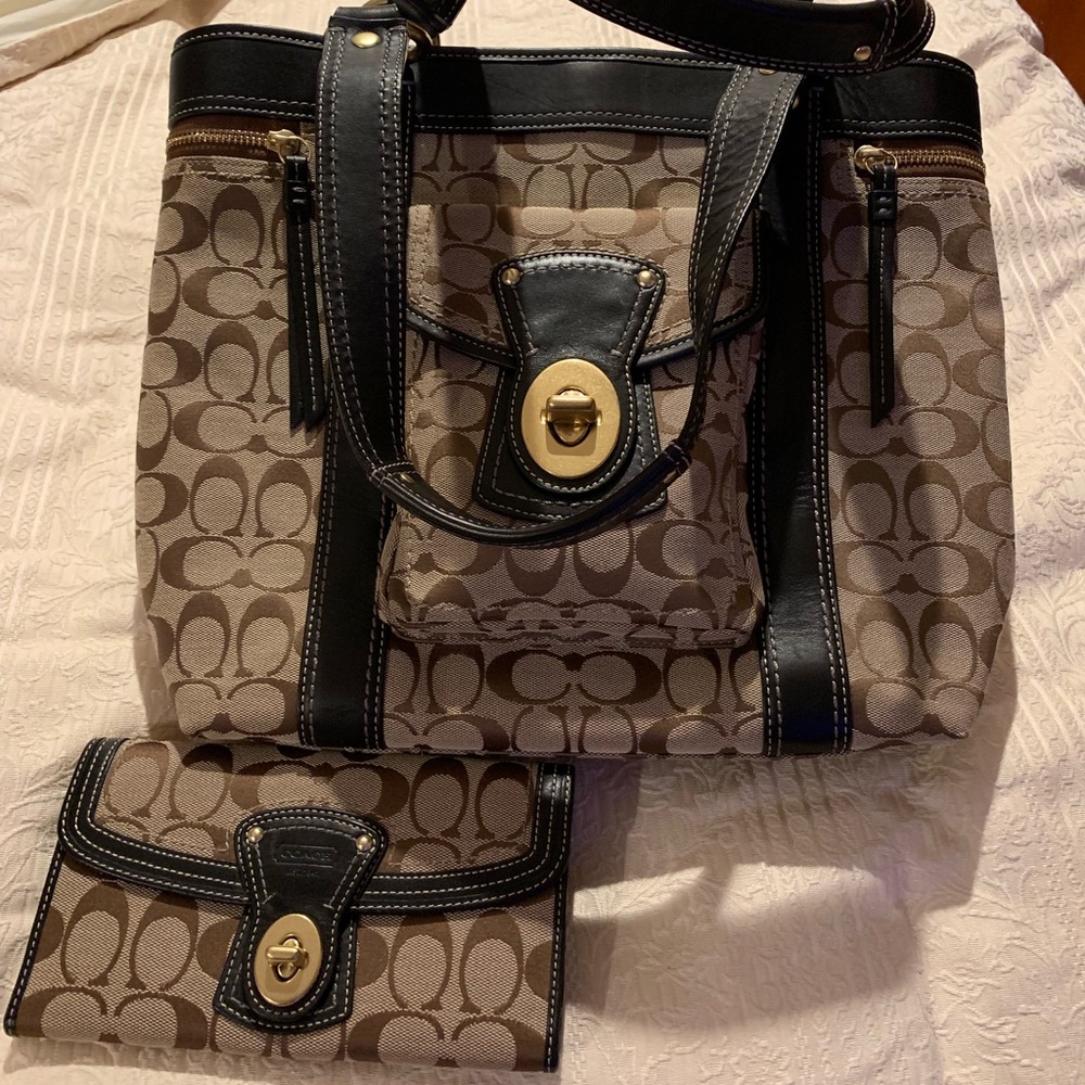 Coach leather trimmed purse and matching wallet.